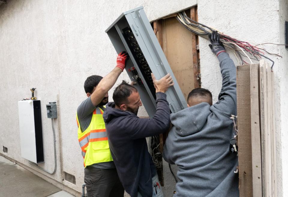 Solar installers install a main service box upgraded to handle 200 amps.