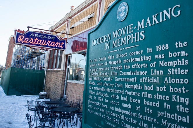 A Shelby County historic marker commemorates "Modern Movie-Making in Memphis" outside The Arcade Restaurant in Downtown Memphis.